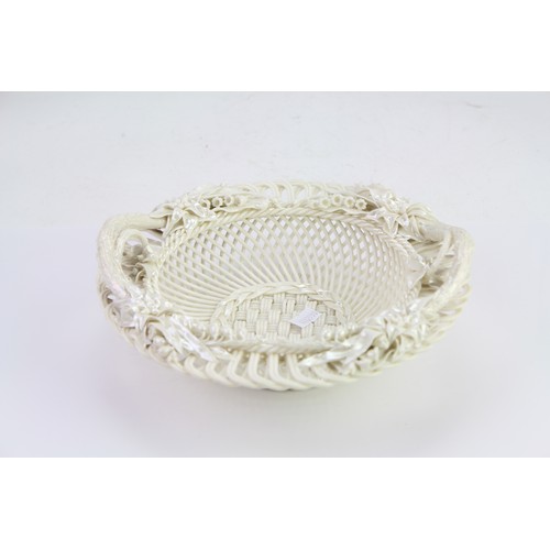 525 - An Antique Belleek two handled Fruit Dish decorated with flowers, Trunks & Basket weave decoration. ... 