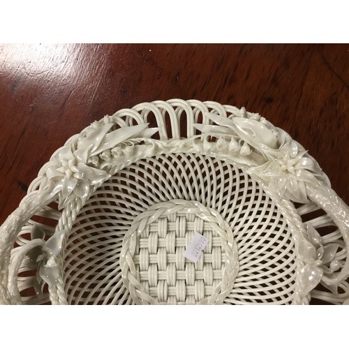 525 - An Antique Belleek two handled Fruit Dish decorated with flowers, Trunks & Basket weave decoration. ... 