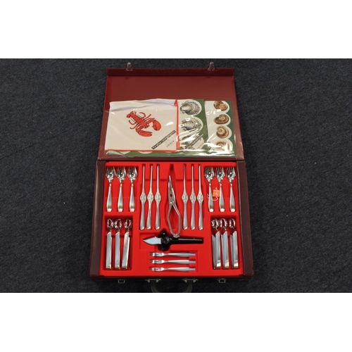 70 - A Boxed Fish Canteen of Cutlery made by 