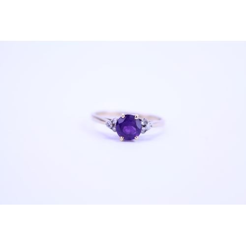 144 - A Ladies 9ct Gold Ring set with an amethyst. Size: n. Weighing: 1.7 grams.