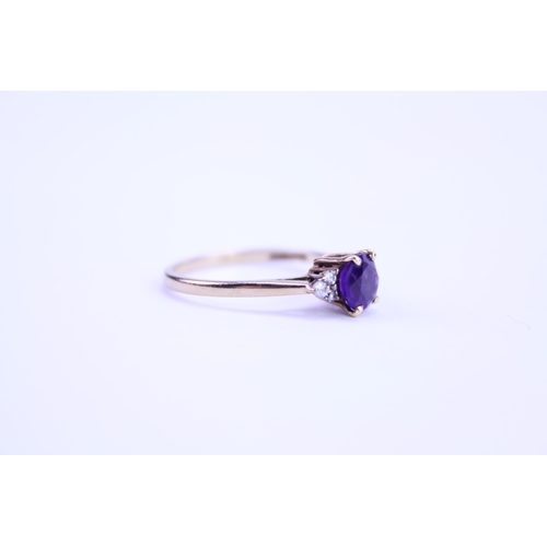 144 - A Ladies 9ct Gold Ring set with an amethyst. Size: n. Weighing: 1.7 grams.