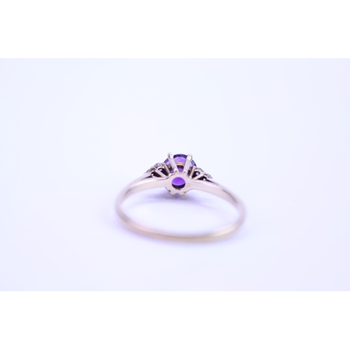 144 - A Ladies 9ct Gold Ring set with an amethyst. Size: n. Weighing: 1.7 grams.