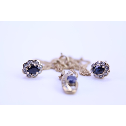 170 - A 9 carat Gold Sapphire and Diamond necklace along with matching earrings.