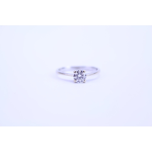 92 - A Ladies 18ct White Gold Dress Ring mounted with a Single Diamond in Original Box. Size: L.