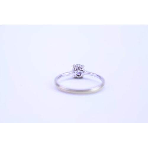 92 - A Ladies 18ct White Gold Dress Ring mounted with a Single Diamond in Original Box. Size: L.