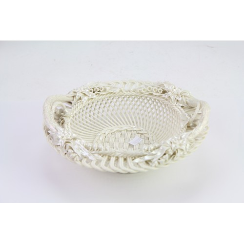 867 - An Antique Belleek two handled Fruit Dish decorated with flowers, Trunks & Basket weave decoration. ... 