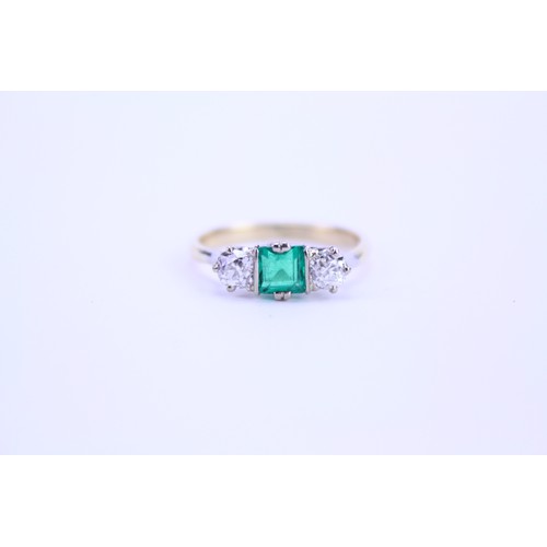 142 - An 18ct Gold Emerald & Diamond Dress Ring. Size: q. Weighing: 3.6 grams.