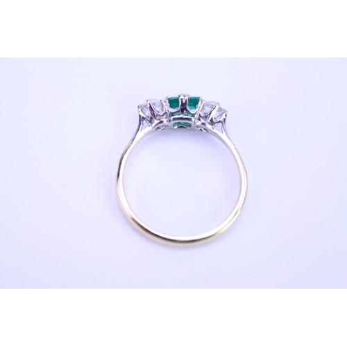 142 - An 18ct Gold Emerald & Diamond Dress Ring. Size: q. Weighing: 3.6 grams.