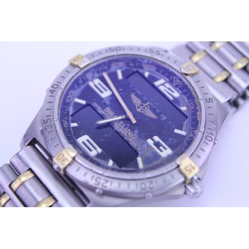 209 - A Scarce Gentleman's Breitling Chronometer Aerospace Wristwatch with Original Titanium Metal Strap. ... 