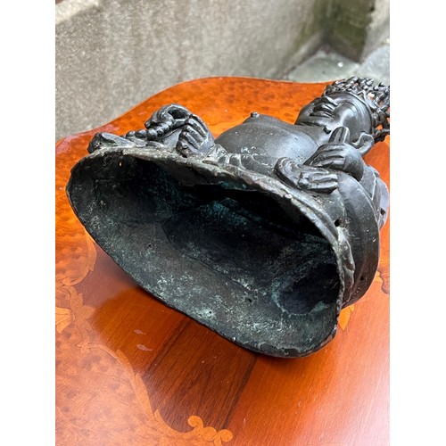 250 - An Study of a Seated Buddha holding a Necklace wearing a Crown. Measuring: 30 cms high x 19 cms acro... 