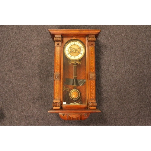 219 - A late 19th Century oak and beech framed regulator wall clock. Size 2ft.