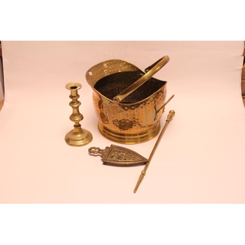 561 - A Brass Coal Scuttle, a Brass Trivet, Candlestick, etc.