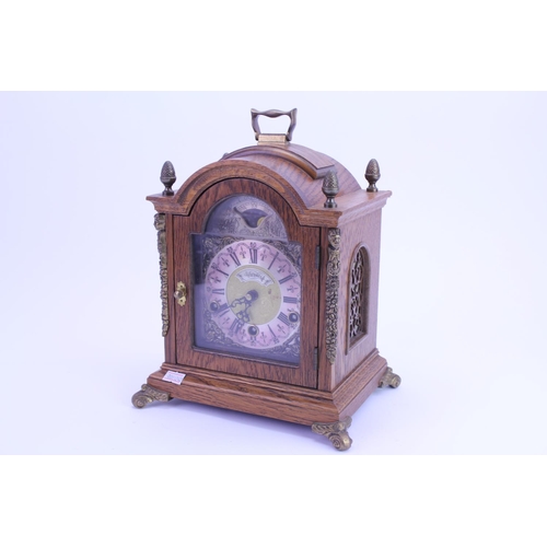 221 - An Oak Cased Mantle Clock with Brass Columns, Pierced Sides, Carrying Handle, Pineapple Finials, mar... 