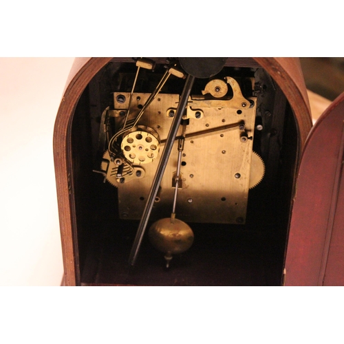 216 - A late 19th century mahogany cased bracket clock, with nickel silver chapter ring, with Roman numera... 