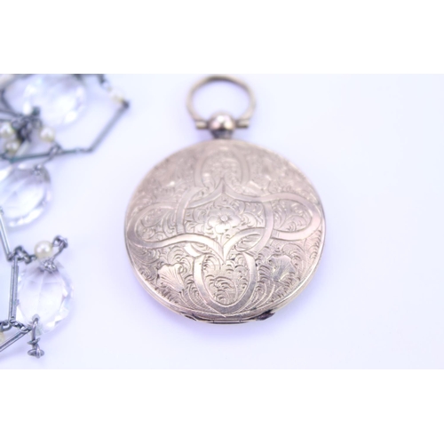 86 - A Ladies Gold Plated & engraved Portrait Locket with a memorial inscription along with a modern neck... 