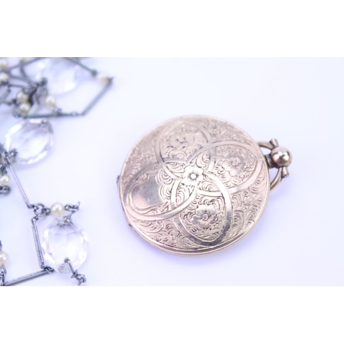 86 - A Ladies Gold Plated & engraved Portrait Locket with a memorial inscription along with a modern neck... 