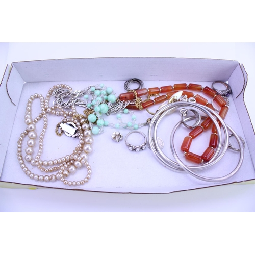 87 - A Collection of Silver Rings, Agate Necklace, Pearl Necklace, etc.