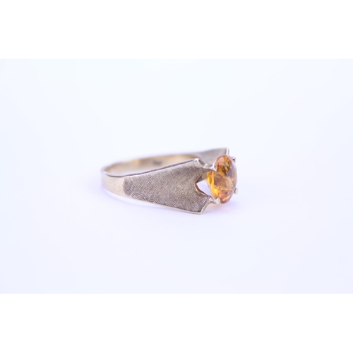 102 - A ladies 1970's 9ct Gold dress ring mounted with a stone. Size approx L.