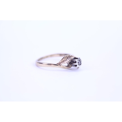 108 - A ladies 9ct Gold dress ring set with a small Diamond. Size approx M.