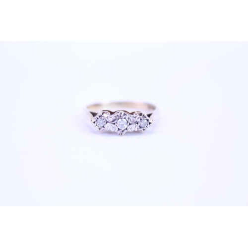 115 - A ladies 9ct Gold dress ring set with illusion set diamonds. Size approx M.