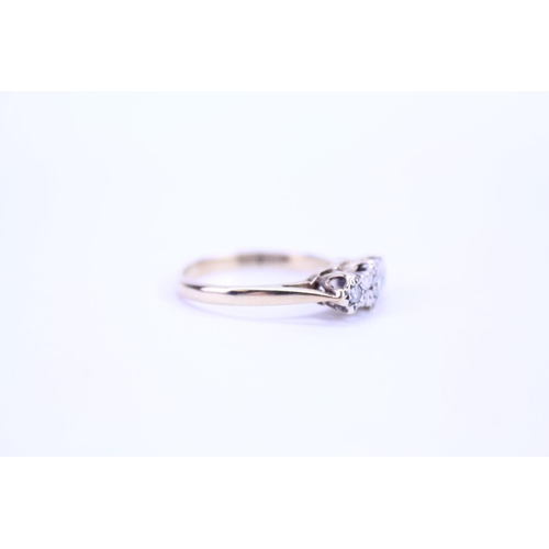 115 - A ladies 9ct Gold dress ring set with illusion set diamonds. Size approx M.