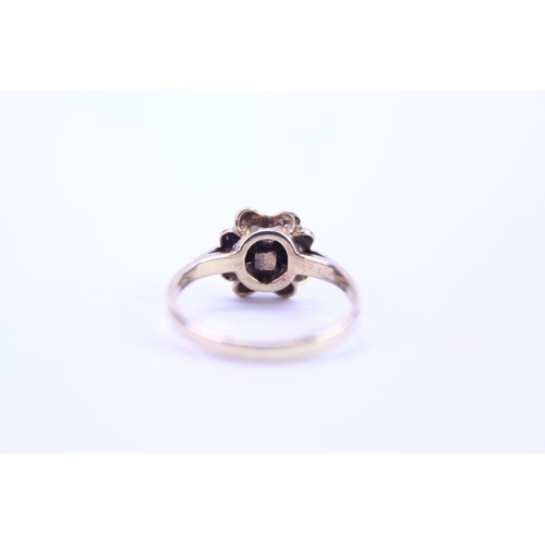 116 - A ladies 9ct Gold dress ring set with a centre 'pearl'. Size is approx M.