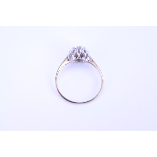 117 - A 9ct Gold dress ring set with diamonds. Size approx H.