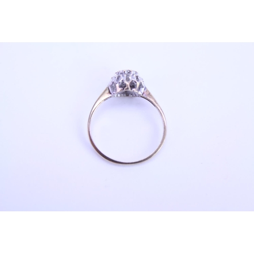 117 - A 9ct Gold dress ring set with diamonds. Size approx H.