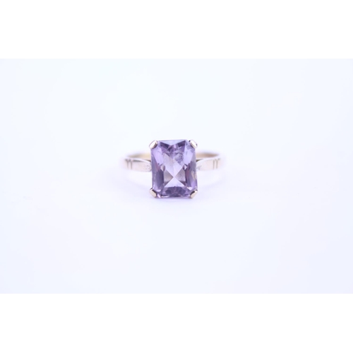 119 - A 9ct Gold dress ring set with an Amethyst. Size approx L.