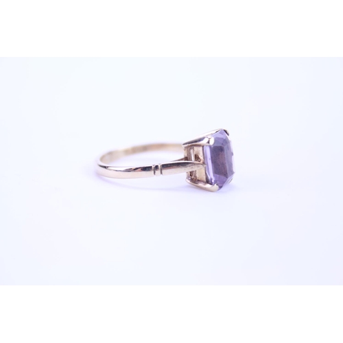 119 - A 9ct Gold dress ring set with an Amethyst. Size approx L.