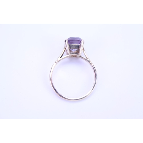 119 - A 9ct Gold dress ring set with an Amethyst. Size approx L.