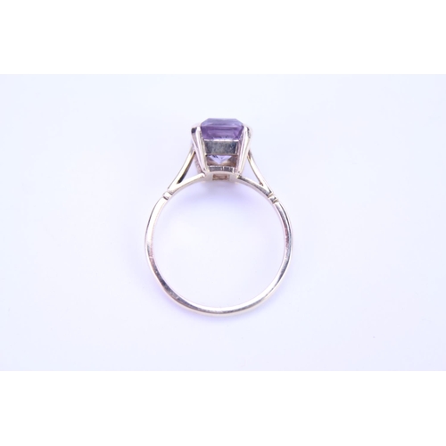 119 - A 9ct Gold dress ring set with an Amethyst. Size approx L.