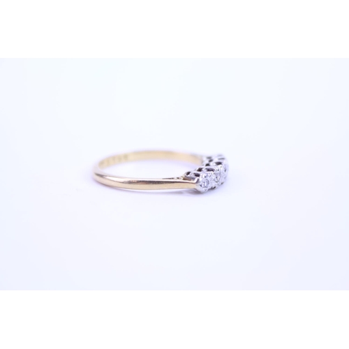 122 - A ladies 18ct Gold dress ring set with 5 Diamonds, in cage setting. Size approx O.