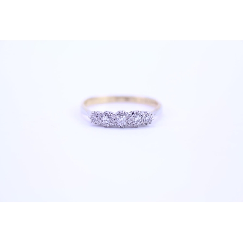 123 - A ladies 9ct Gold and Platinum dress ring set with Diamonds. Size approx. R.