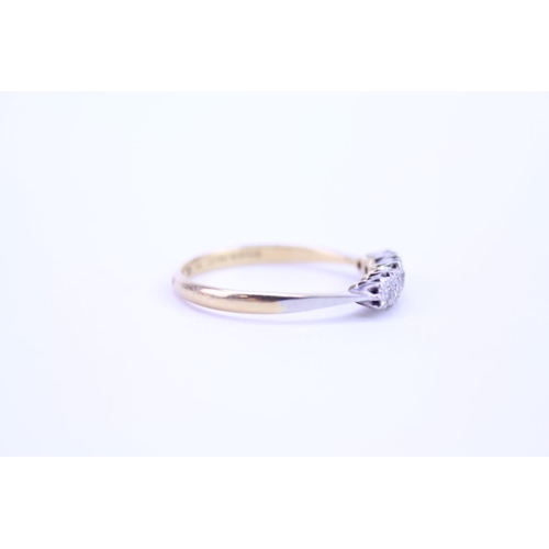 123 - A ladies 9ct Gold and Platinum dress ring set with Diamonds. Size approx. R.