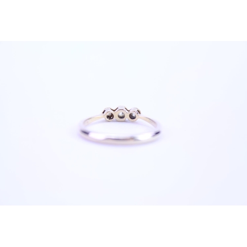 124 - A ladies 18ct Gold dress ring set with diamonds. Size approx M.