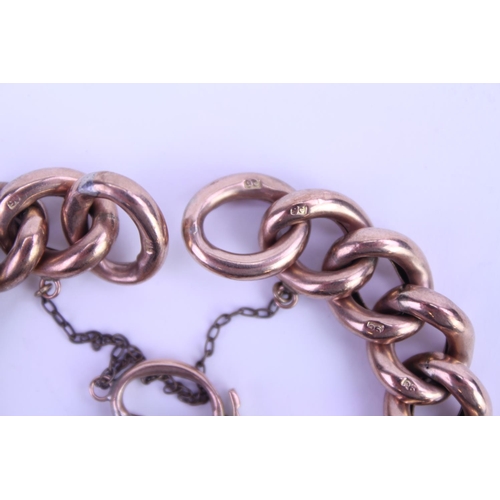 95 - A Victorian 9ct Gold marked and engraved curb bracelet. Weight approx 25 grams.