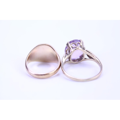 97 - A 9ct Gold Signet Ring, a 9ct Gold Ring set with an Amethyst along with three Silver rings. Gold Wei... 