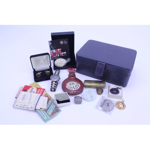 151 - A Morgan Wristwatch, a Royal Mint coin, Silver rings, etc.