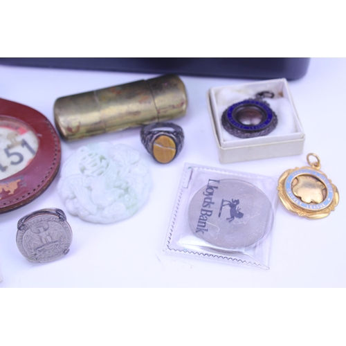 151 - A Morgan Wristwatch, a Royal Mint coin, Silver rings, etc.