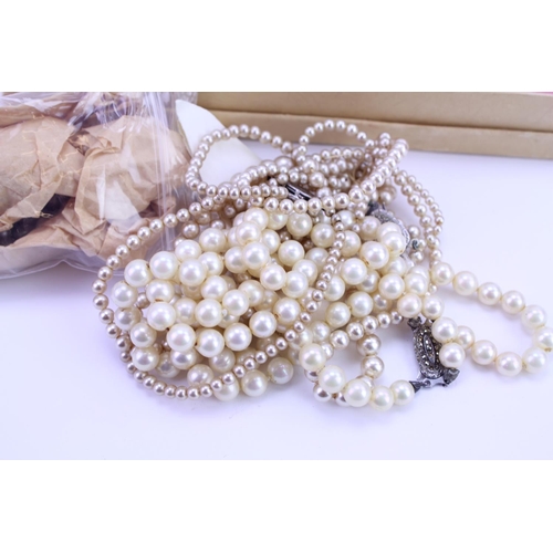 152 - A collection of various 'pearls' to include necklaces with Silver clasps, etc.