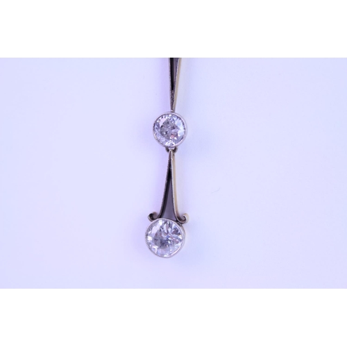 146 - An 18ct yellow & white Gold necklace, set with 3 old cut Diamonds. Diamond is descending order appro... 