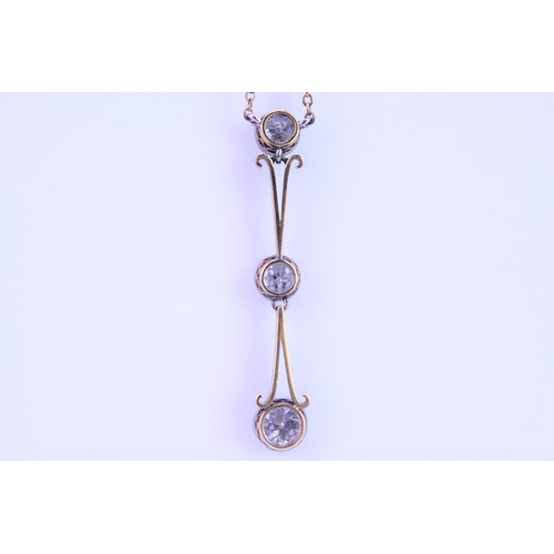 146 - An 18ct yellow & white Gold necklace, set with 3 old cut Diamonds. Diamond is descending order appro... 