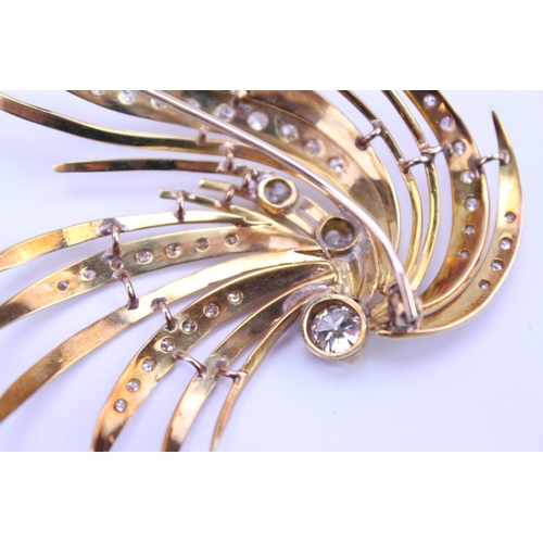 147 - An 18ct Gold Diamond spray brooch, set with three old cut Diamonds, along with 34 small Diamonds. Th... 