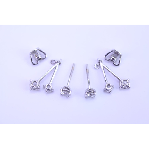 139 - A Pair of Diamond Drop Earrings set is 18ct white Gold. 0.2ct approximately is the largest diamond.