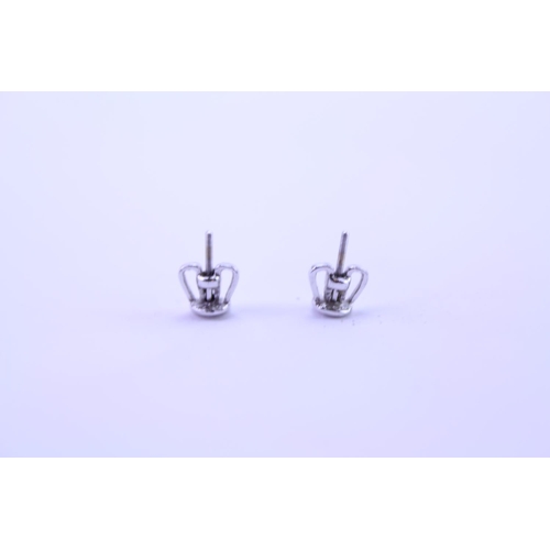 139 - A Pair of Diamond Drop Earrings set is 18ct white Gold. 0.2ct approximately is the largest diamond.