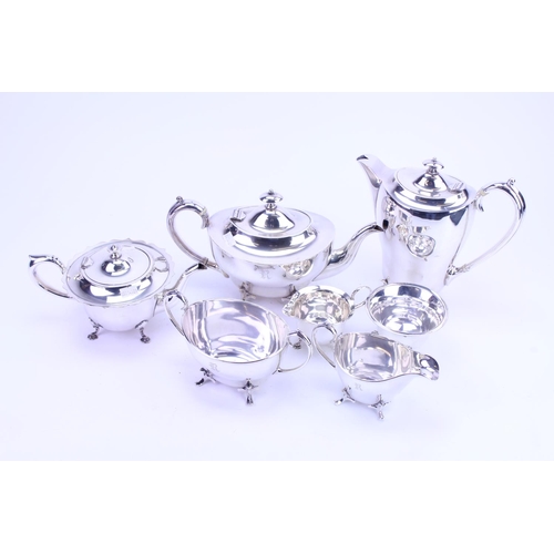 65 - A Collection of Silver Plate to include Silver Plated Tea Pots, Coffee Pots, Sugar & Creams.