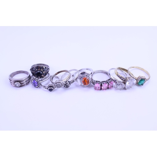 162 - A Collection of Silver Dress Rings set with various stones, One ring unmarked. Total weight: approx ... 