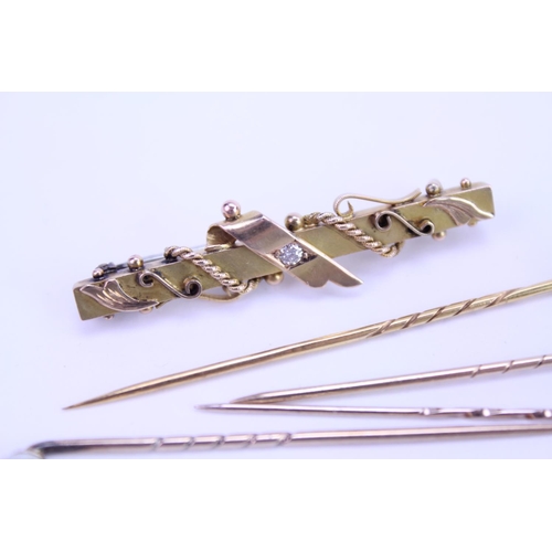 157 - A collection of 3 x 9ct Gold stick pins, a 15ct marked stick pin with a blue stone along with a 9ct ... 