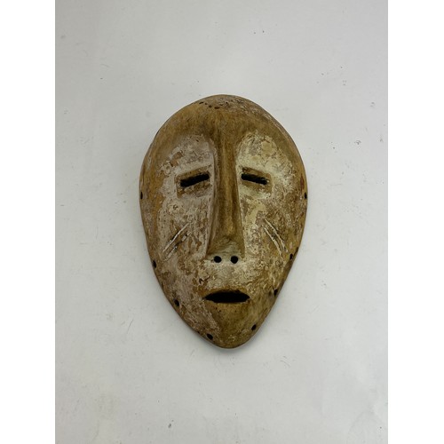 567A - A carved Tribal mask, for ceremonial use.